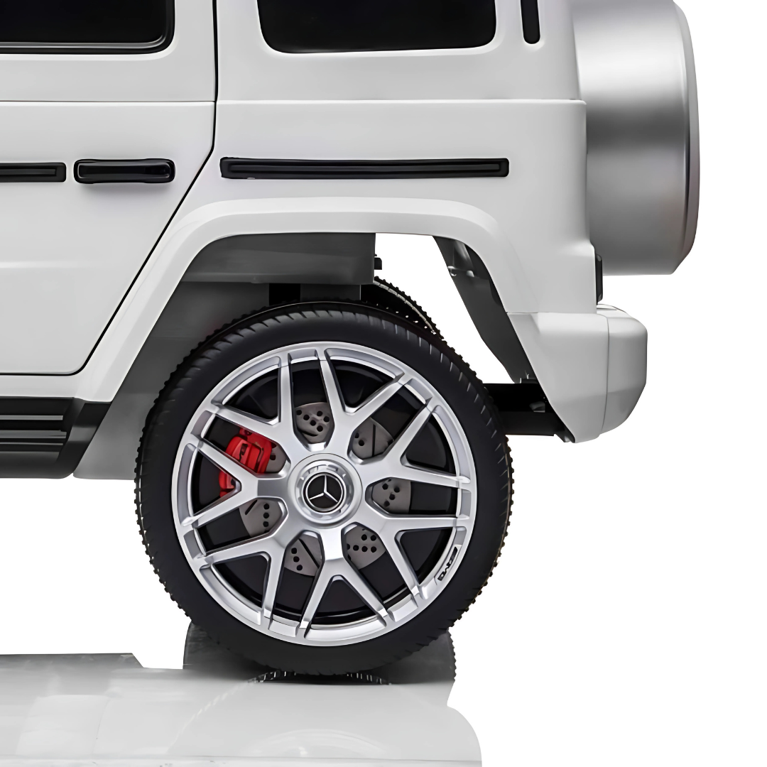 24V Exclusive White Mercedes Benz G63 2-Seater 4x4 Kids' Ride-on SUV W/ EVA Wheels, Leather Seats, Light-up Logo, BT & RC