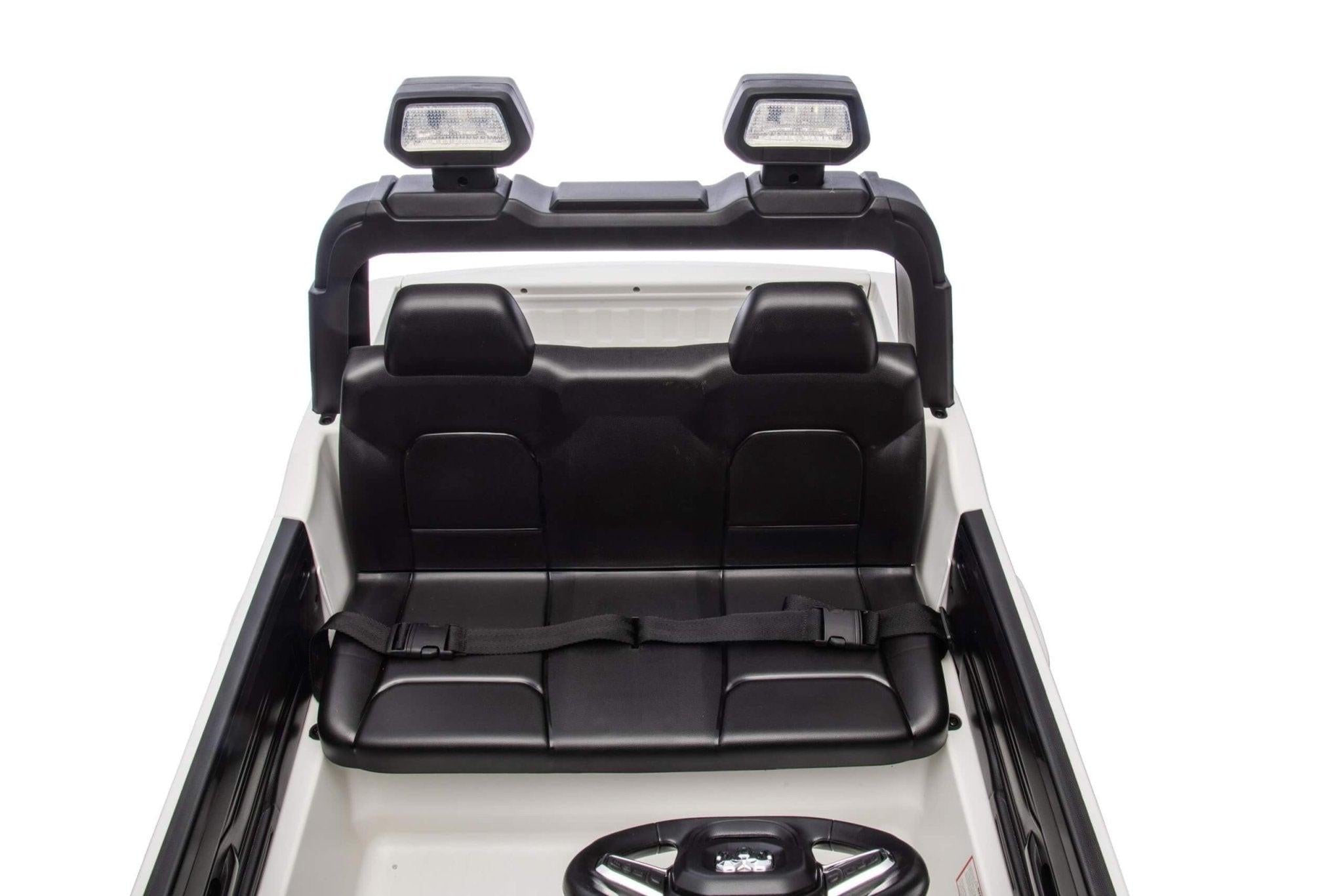 White Complete Edition XXL 2-Seater 4x4 RAM 3500 Ride-On Truck.