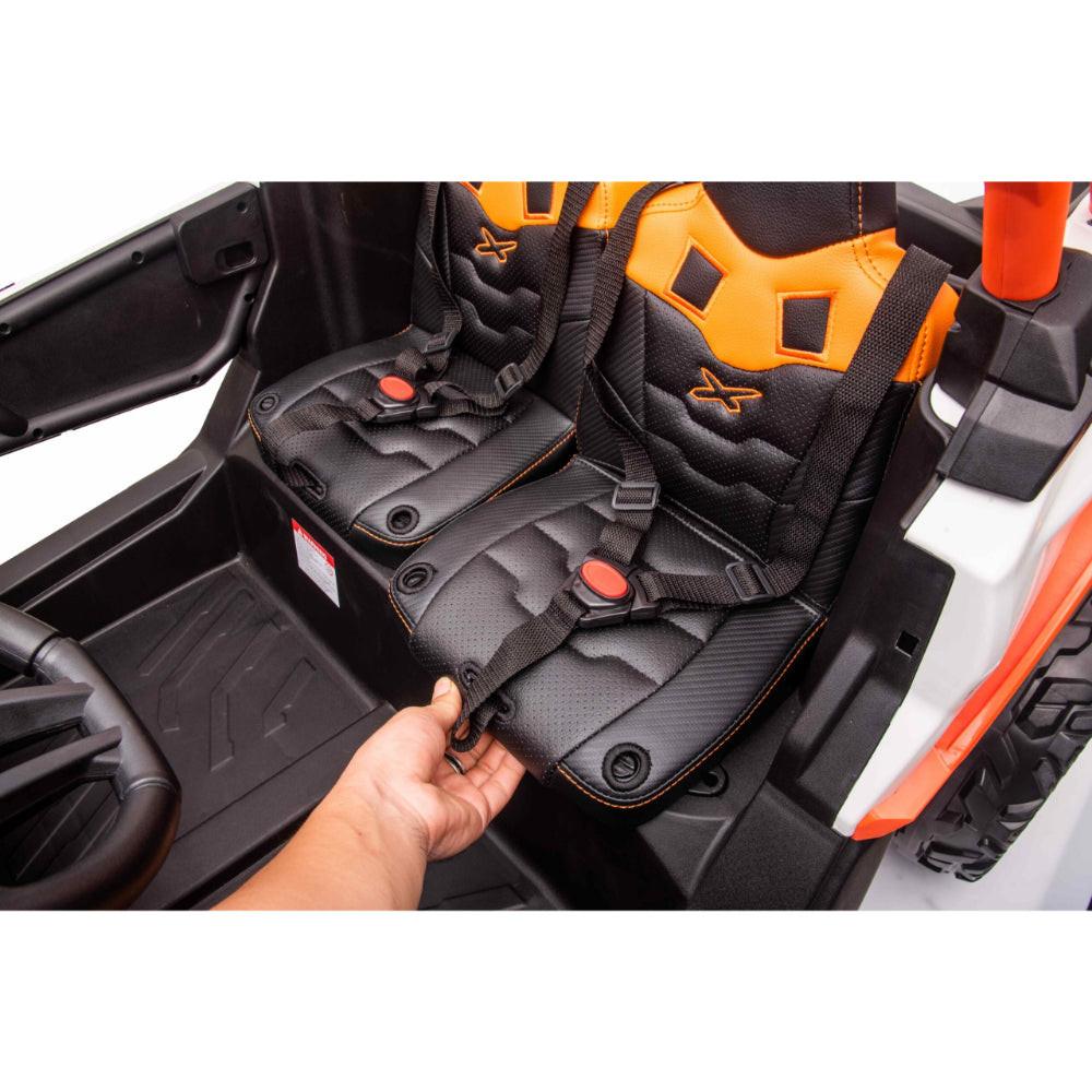 Orange Licensed LX Performance Edition 2X24V Can-Am Maverick 2-Seater 4WD UTV W/ EVA Wheels, Dual Battery Pack, Music, Leather Seats & RC