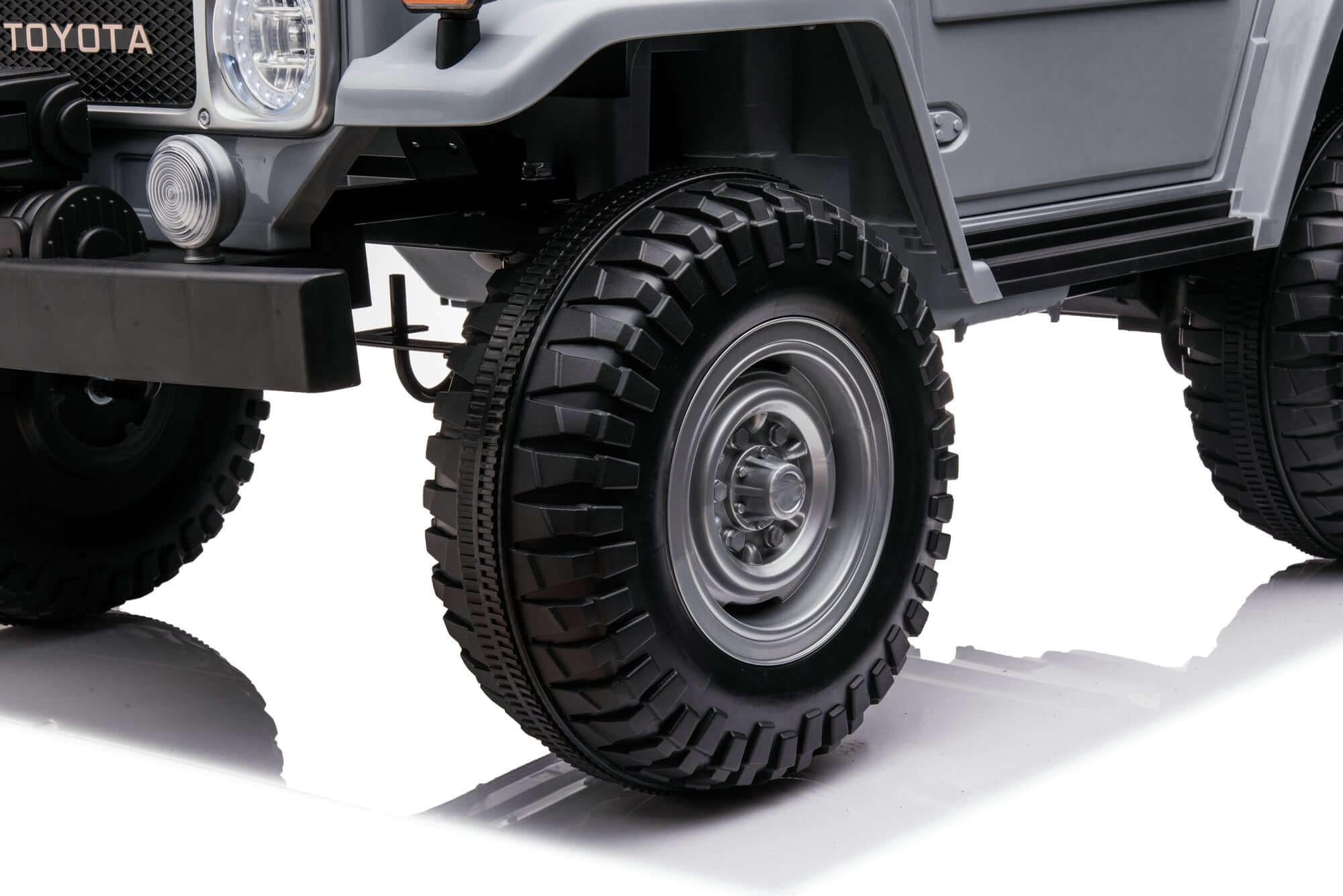 24V Grey 2-Seater Premium Edition Toyota 4x4 Truck for Kids W/ EVA Rubber Wheels, Music & RC.