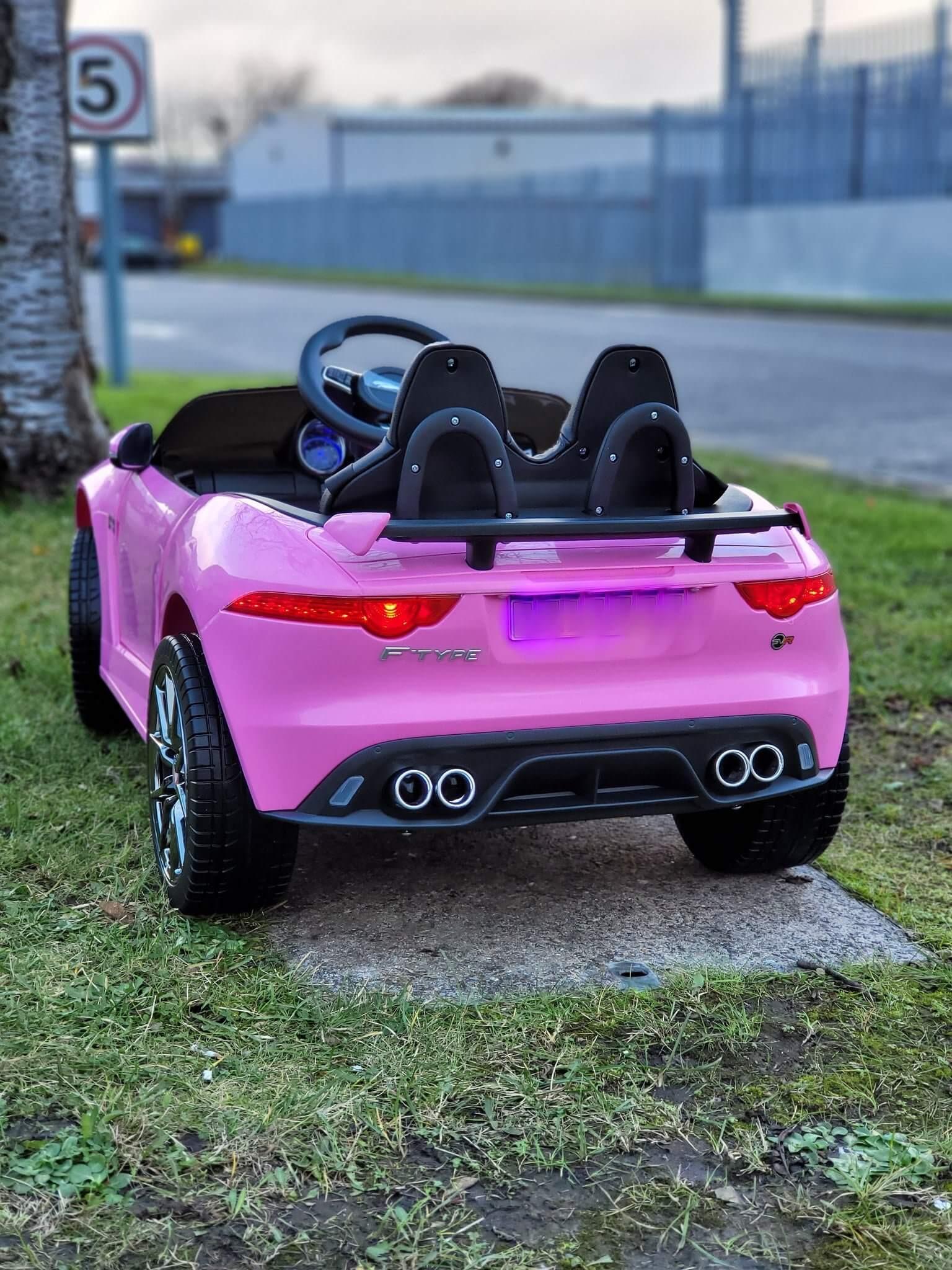 12V Pink Jaguar F Type Kids' Licensed Ride-On Car W/ Rubber Wheels, Bluetooth & RC.