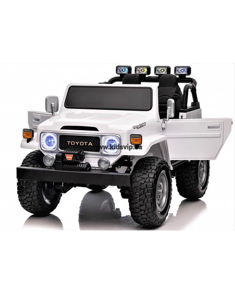 24V White 2-Seater Premium Edition Toyota 4x4 Truck for Kids W/ EVA Rubber Wheels, Music & RC.