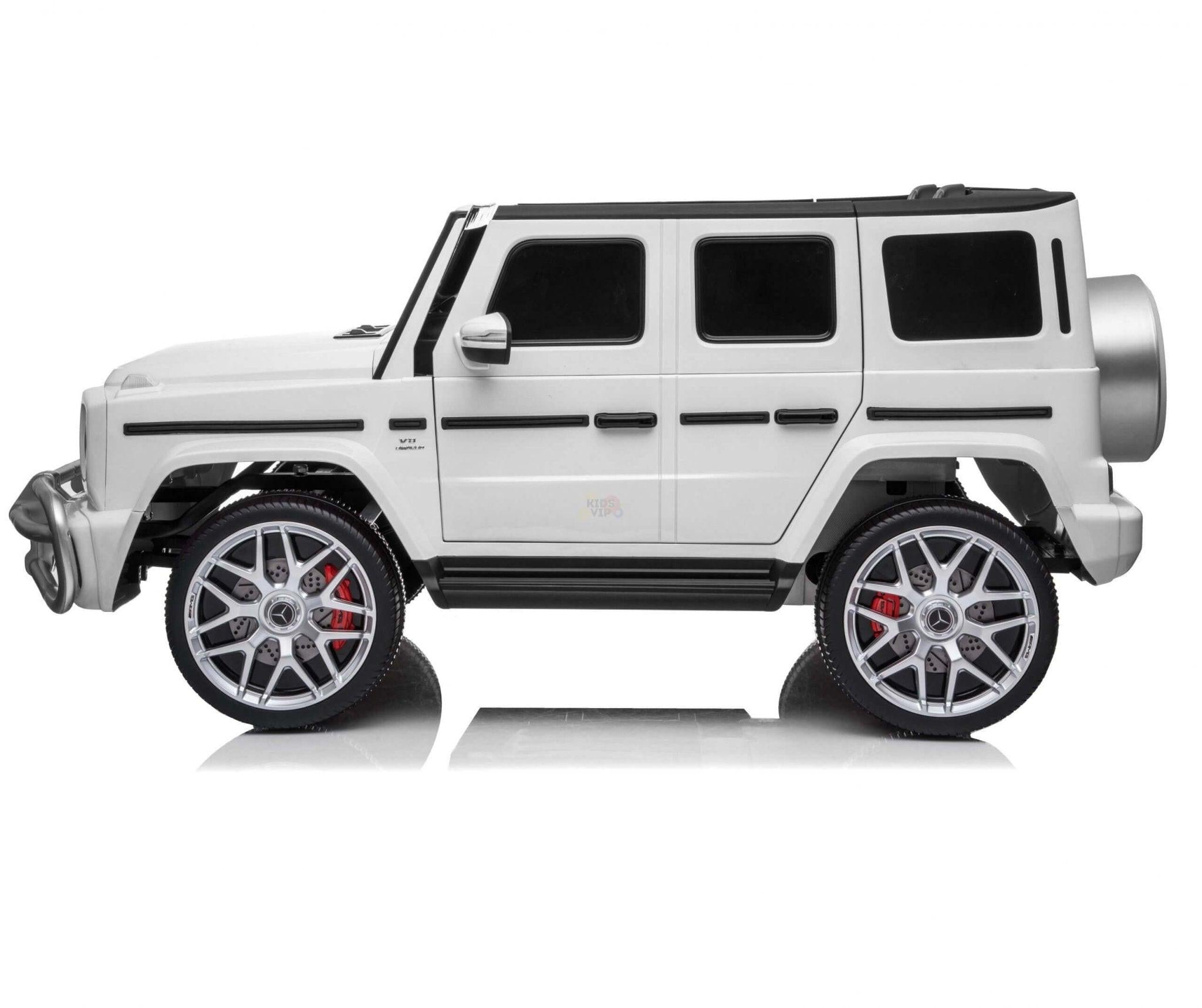 24V Exclusive White Mercedes Benz G63 2-Seater 4x4 Kids' Ride-on SUV W/ EVA Wheels, Leather Seats, Light-up Logo, BT & RC.