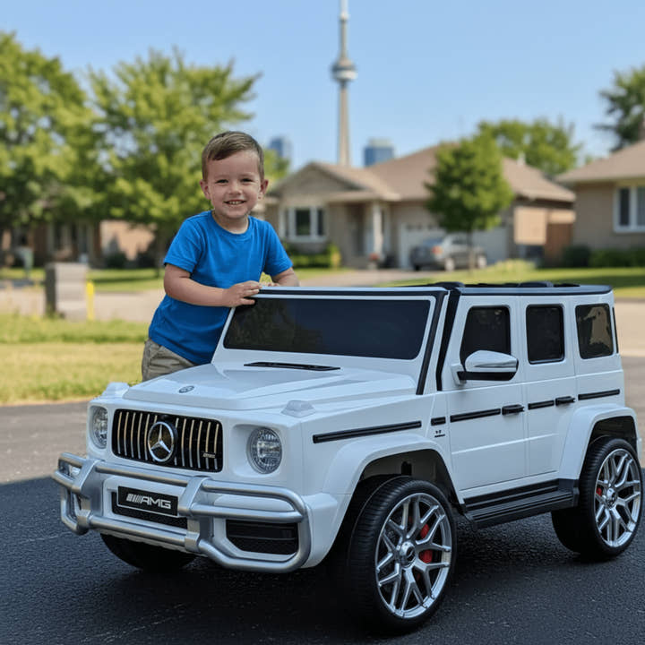 24V Exclusive White Mercedes Benz G63 2-Seater 4x4 Kids' Ride-on SUV W/ EVA Wheels, Leather Seats, Light-up Logo, BT & RC.