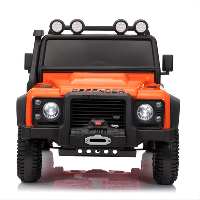 12V Orange Land Rover Defender 1-Seater AWD Ride-on Truck W/ Rubber Wheels, Music Player & RC.