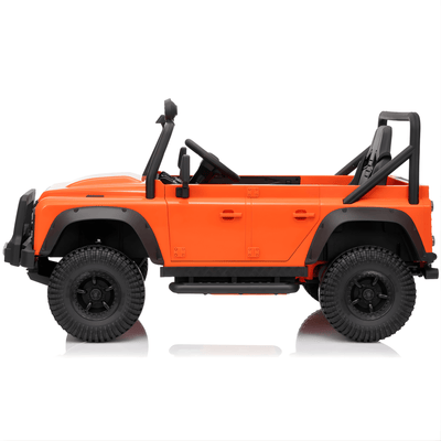 12V Orange Land Rover Defender 1-Seater AWD Ride-on Truck W/ Rubber Wheels, Music Player & RC.