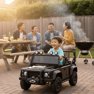 12V Black Land Rover Defender 1-Seater AWD Ride-on Truck W/ Rubber Wheels, Music Player & RC.