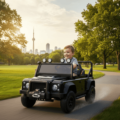 12V Black Land Rover Defender 1-Seater AWD Ride-on Truck W/ Rubber Wheels, Music Player & RC.