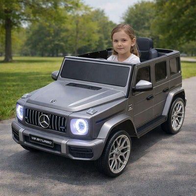 12V Luxury Matte Grey Edition Mercedes Benz AMG G63 Ride-On SUV W/ Rubber Wheels, Leather Seat, Bluetooth & RC.