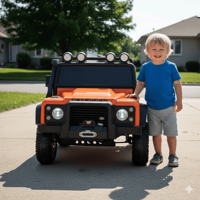 12V Orange Land Rover Defender 1-Seater AWD Ride-on Truck W/ Rubber Wheels, Music Player & RC.