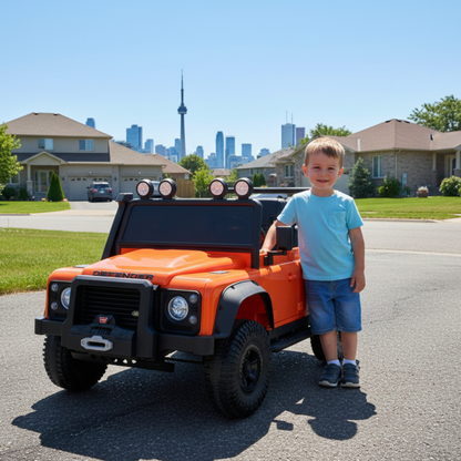 12V Orange Land Rover Defender 1-Seater AWD Ride-on Truck W/ Rubber Wheels, Music Player & RC