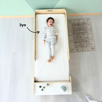APPLE JUNIOR - Montessori Floor Bed with Rails & Shelves.