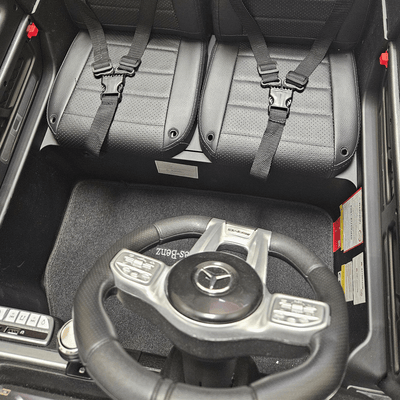 24V Exclusive Matte Black Mercedes Benz G63 2-Seater 4x4 Kids' Ride-on SUV W/ EVA Wheels, Leather Seats, Light-up Logo, BT & RC.