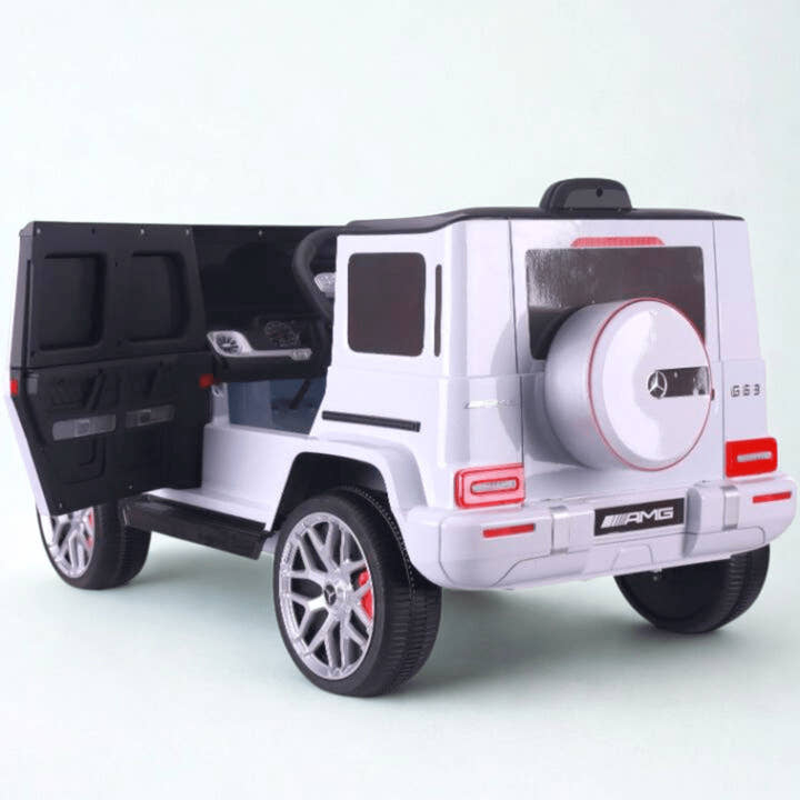 12V Luxury White Mercedes Benz AMG G63 Ride-On SUV W/ Rubber Wheels, Leather Seat, Bluetooth & RC.