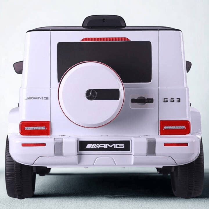 12V Luxury White Mercedes Benz AMG G63 Ride-On SUV W/ Rubber Wheels, Leather Seat, Bluetooth & RC.
