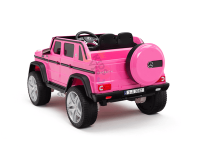 12V Pink Luxury Mercedes Maybach G650s Kids' 4x4 Ride-on SUV W/ Rubber Wheels, Music & RC.
