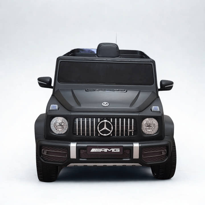 12V Luxury Matte Black Edition Mercedes Benz AMG G63 Ride-On SUV W/ Rubber Wheels, Leather Seat, Bluetooth & RC.