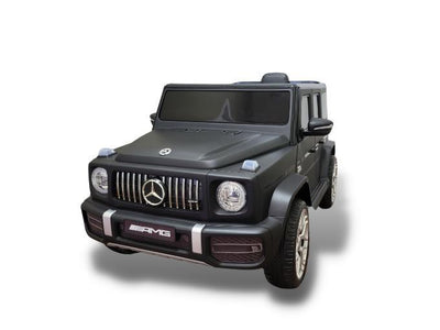 12V Luxury Matte Black Edition Mercedes Benz AMG G63 Ride-On SUV W/ Rubber Wheels, Leather Seat, Bluetooth & RC.